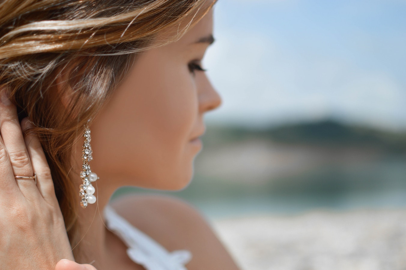 Woman wearing beautiful earrings